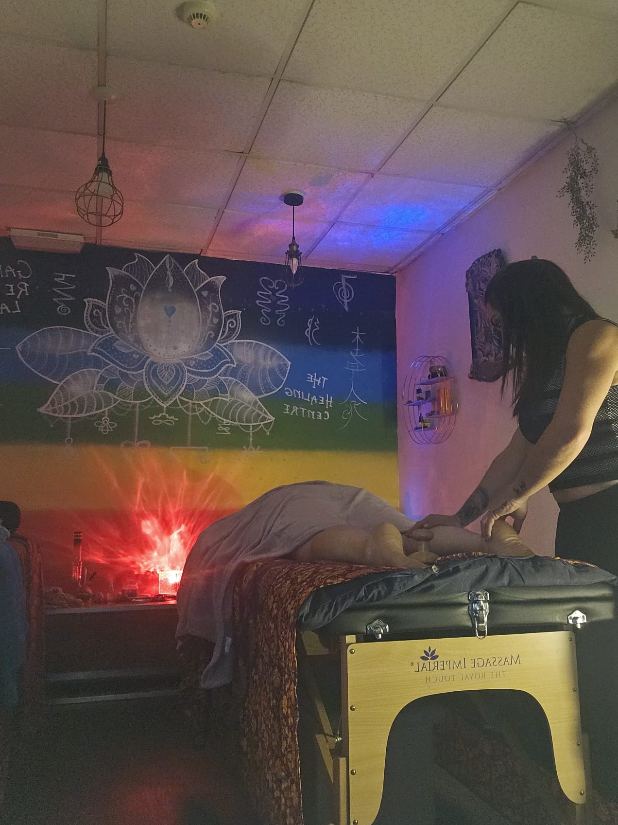 Treatment room with chakra mural